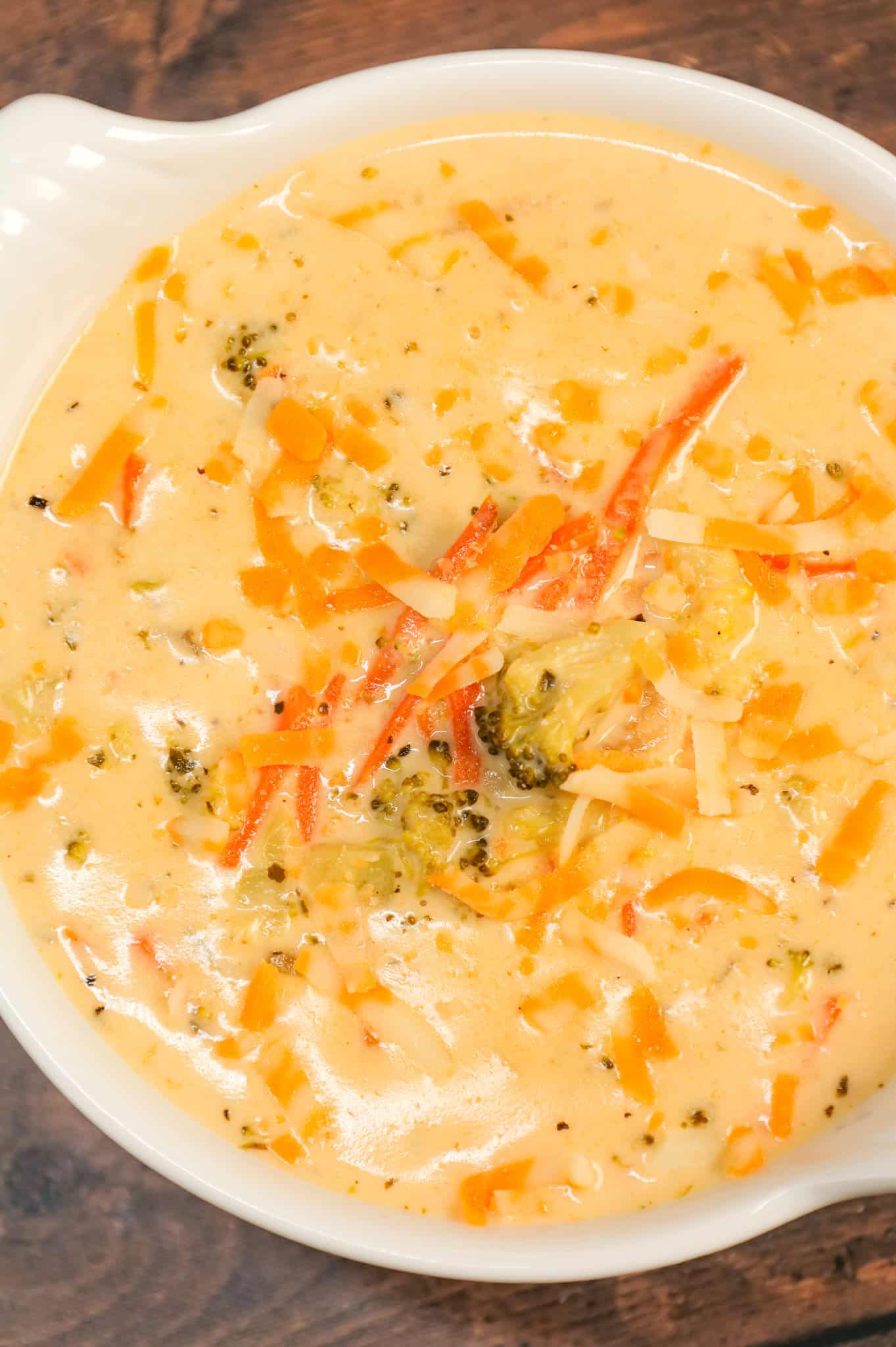 Crock Pot Broccoli Cheddar Soup is a hearty cream soup recipe loaded with broccoli florets, carrots and cheddar cheese.