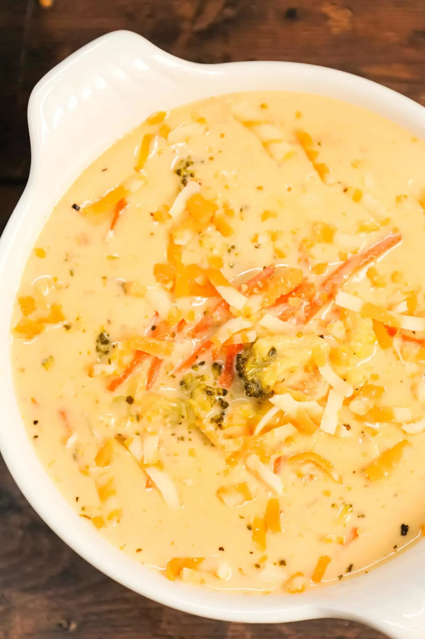 Crock Pot Broccoli Cheddar Soup is a hearty cream soup recipe loaded with broccoli florets, carrots and cheddar cheese.