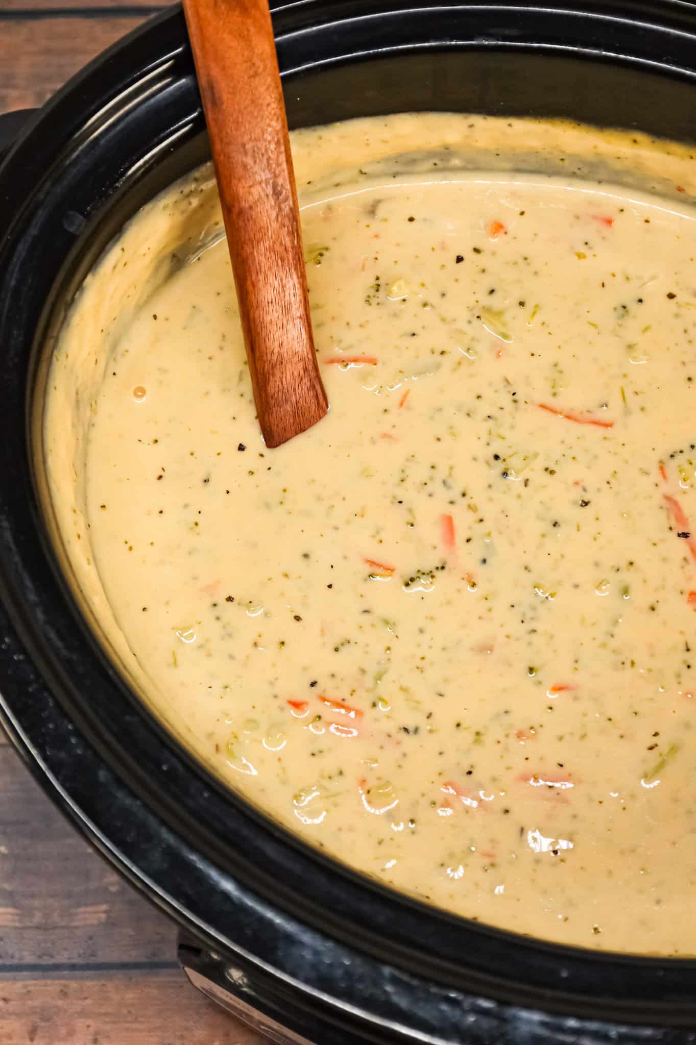 Crock Pot Broccoli Cheddar Soup is a hearty cream soup recipe loaded with broccoli florets, carrots and cheddar cheese.