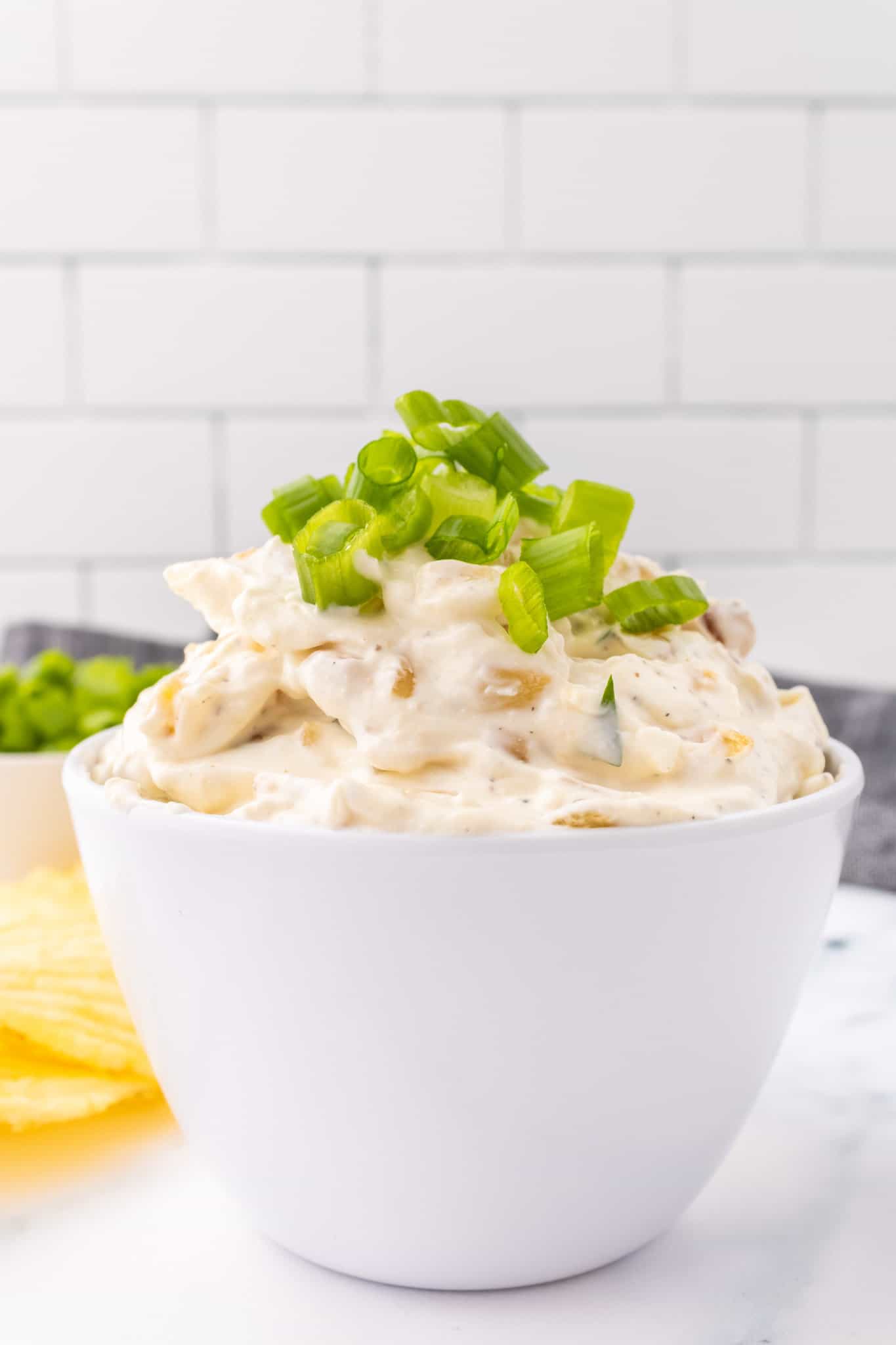 French Onion Dip is a creamy mayo and sour cream based dip loaded with caramelized onions and seasoned with garlic, salt and pepper.