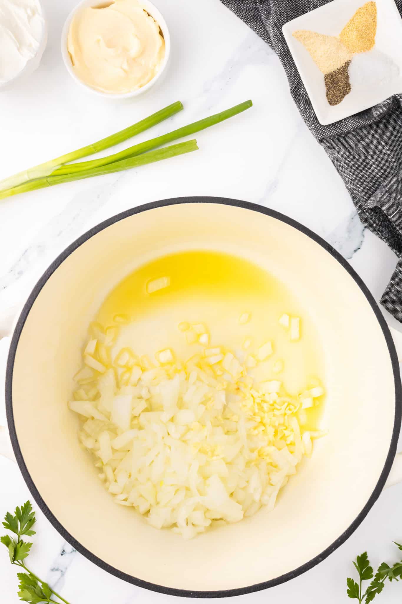 melted butter, minced garlic and diced onions in a skillet