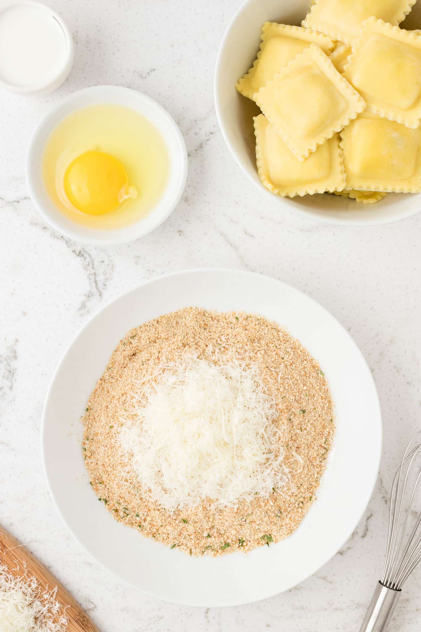 Italian bread crumbs and parmesan cheese in a bowl