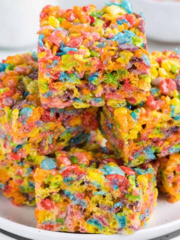 Fruity Pebbles Treats are delicious and colourful marshmallow cereal treats.