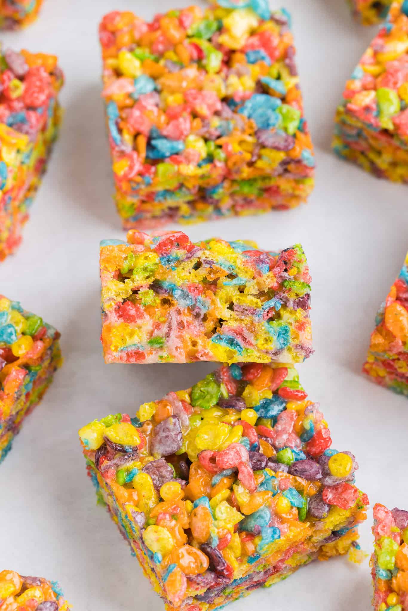 Fruity Pebbles Treats are delicious and colourful marshmallow cereal treats.