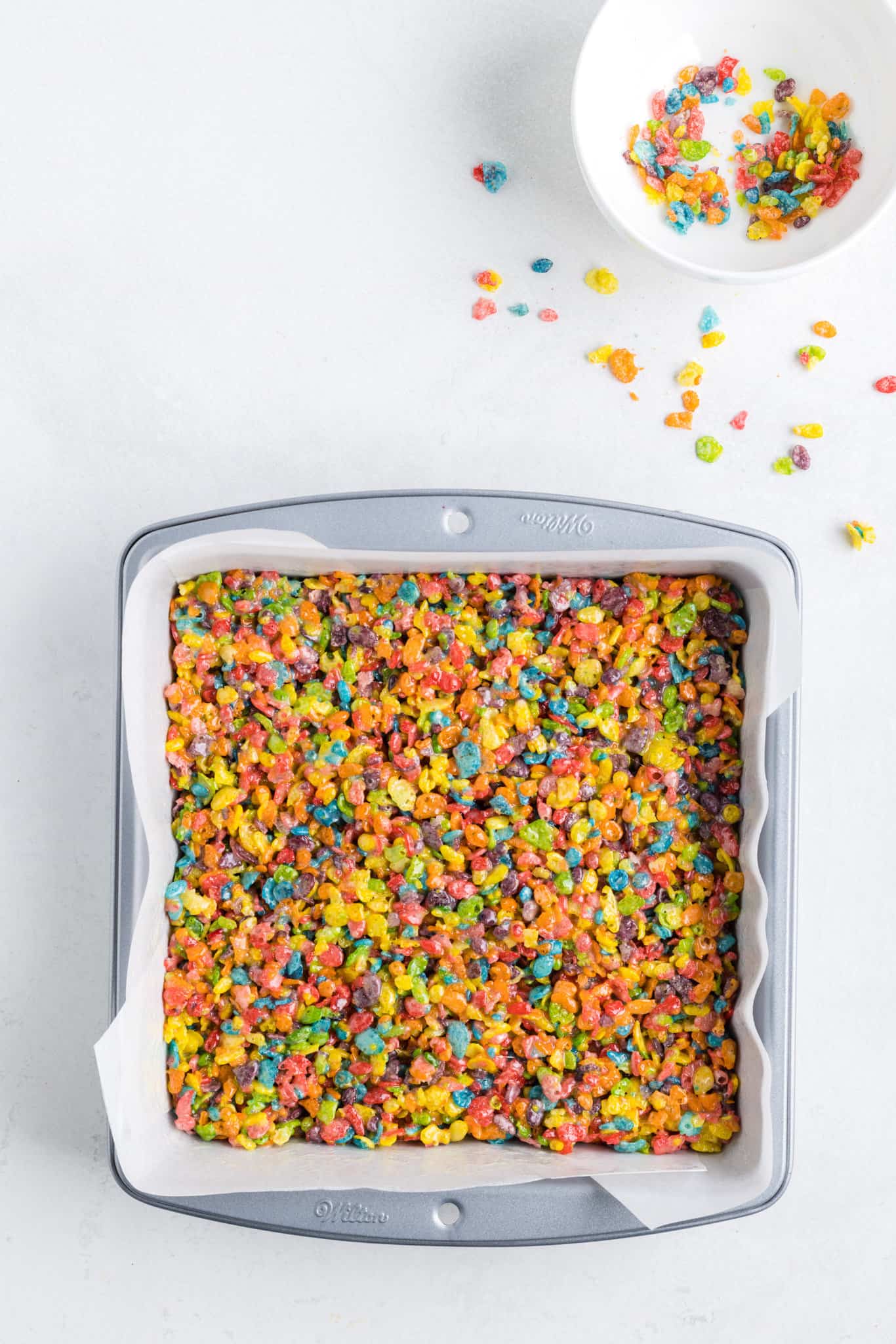 Fruity Pebbles Treats are delicious and colourful marshmallow cereal treats.