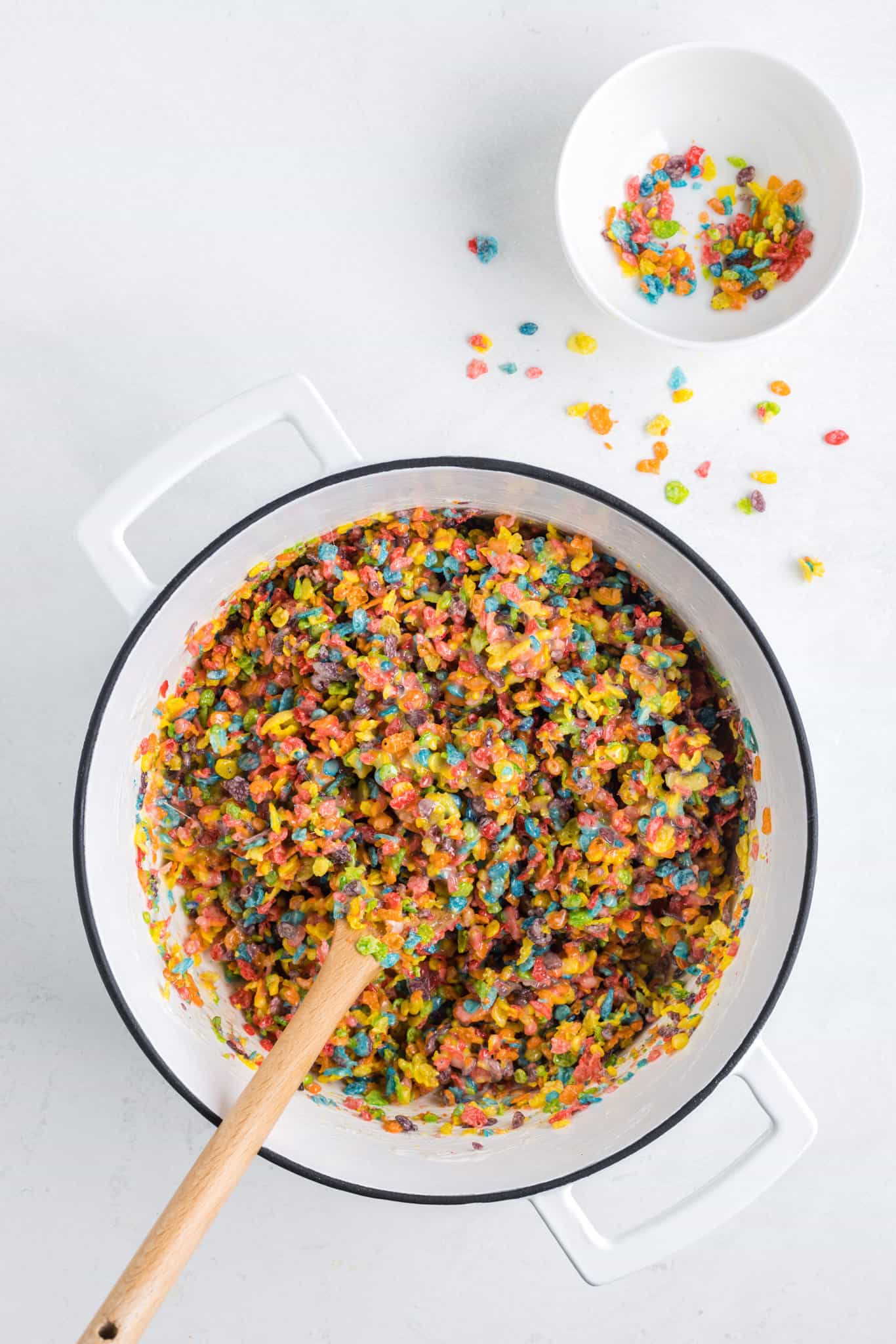 fruity pebbles and marshmallow mixture in a large pot