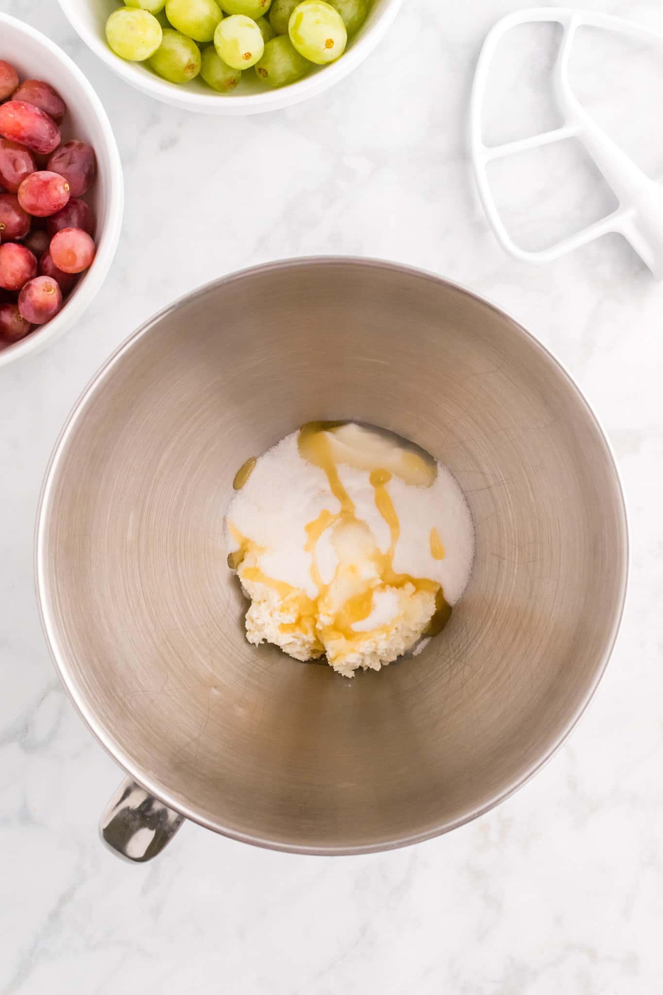 cream cheese, yogurt, honey and granulated sugar in a bowl