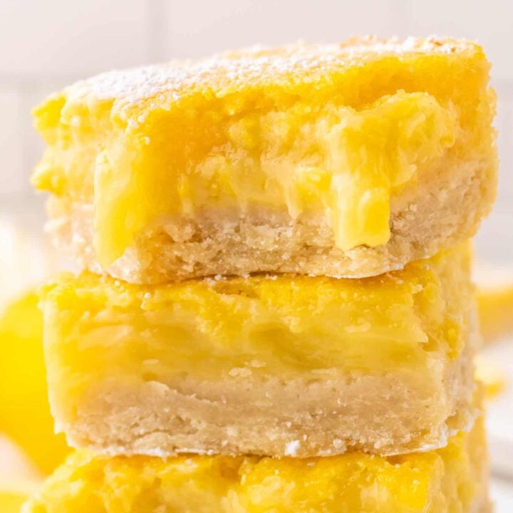 Lemon Bars are a decadent dessert with a shortbread like base topped with a smooth, rich lemon layer.