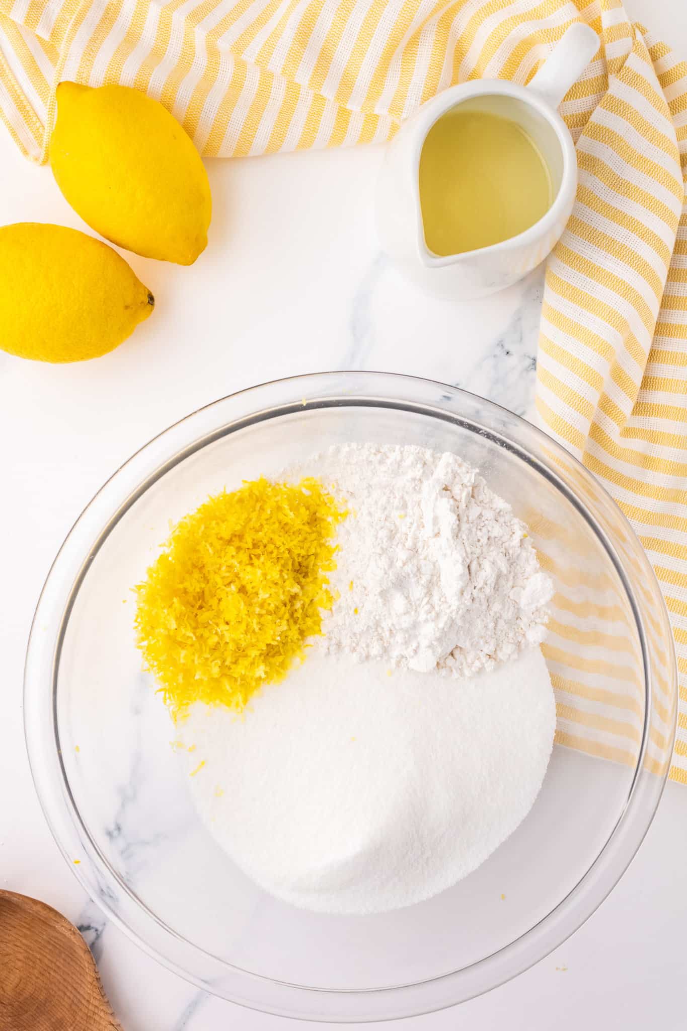 flour, granulated sugar and lemon zest in a bowl