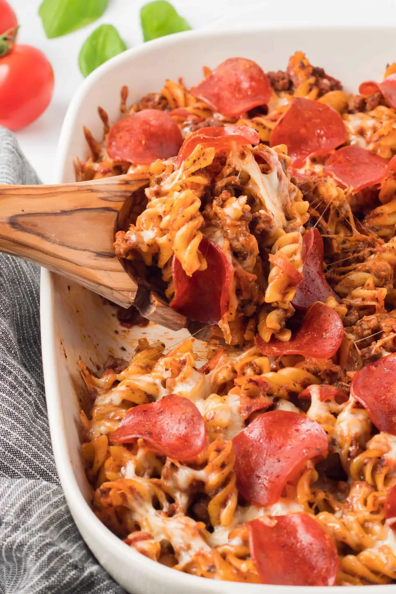 Pizza Casserole is a delicious baked rotini pasta loaded with ground beef, pizza sauce, pepperoni and mozzarella cheese.