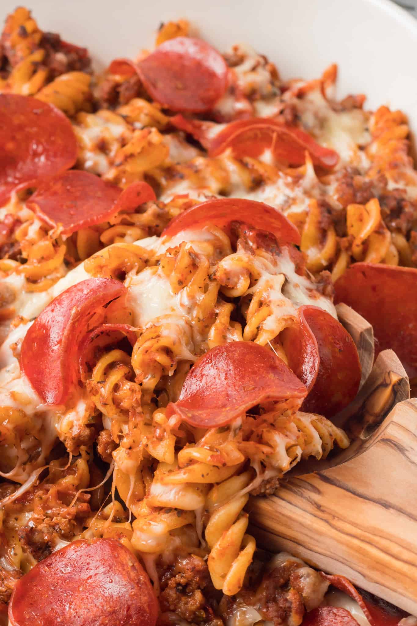 Pizza Casserole is a delicious baked rotini pasta loaded with ground beef, pizza sauce, pepperoni and mozzarella cheese.