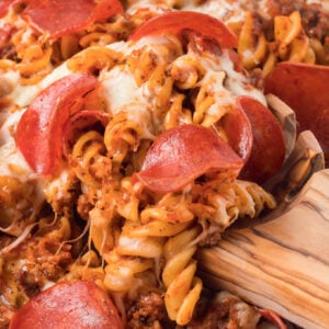 Pizza Casserole is a delicious baked rotini pasta loaded with ground beef, pizza sauce, pepperoni and mozzarella cheese.