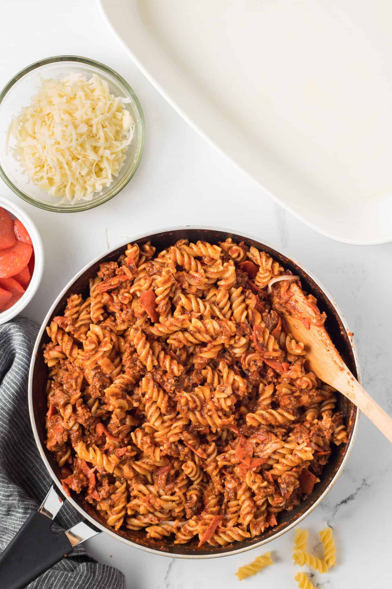 rotini pasta mixture in a skillet