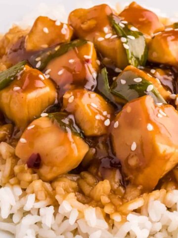 Mongolian Chicken is an easy chicken dish made with diced chicken breast chunks cooked in a sweet and savory sauce made with soy sauce, brown sugar, honey, ginger, garlic and with a bit of a kick from red pepper flakes.