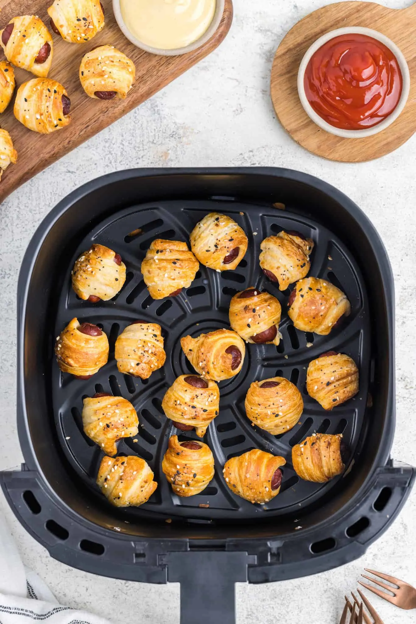 Air Fryer Pigs in a Blanket are the perfect party snack or kid friendly dinner using cocktail sausages, Pillsbury crescent dough and everything bagel seasoning.