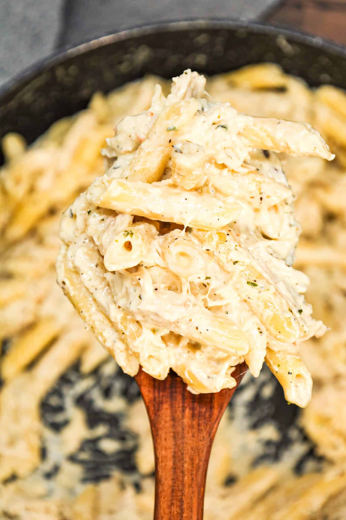 Chicken Alfredo Penne is an easy stove top pasta recipe loaded with shredded rotisserie chicken all tossed in a creamy garlic parmesan sauce.