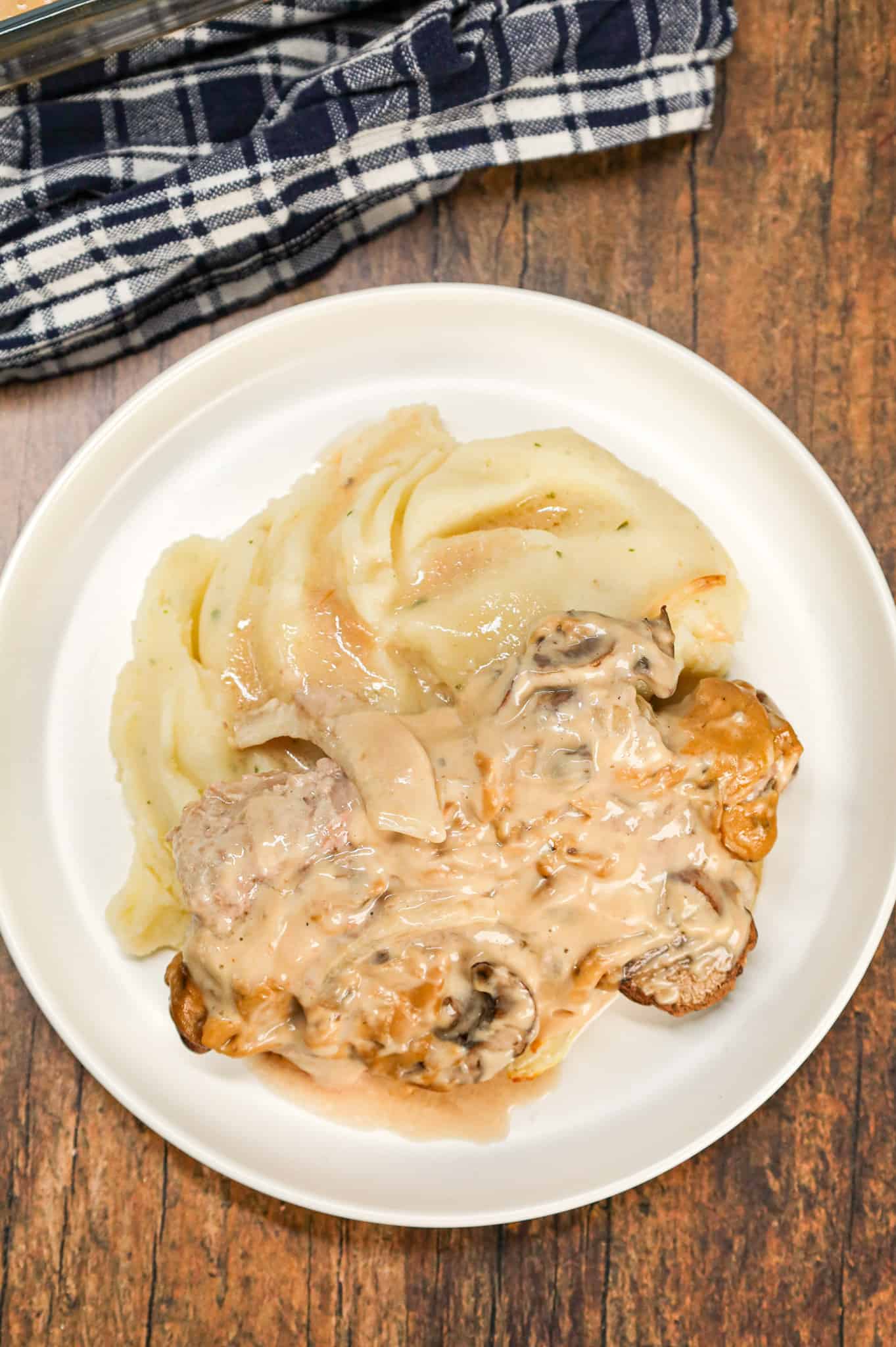 Cream of Mushroom Pork Chops are an easy baked pork chop recipe made with cream of mushroom soup, sour cream, pork gravy mix, sliced onions and sliced mushrooms.