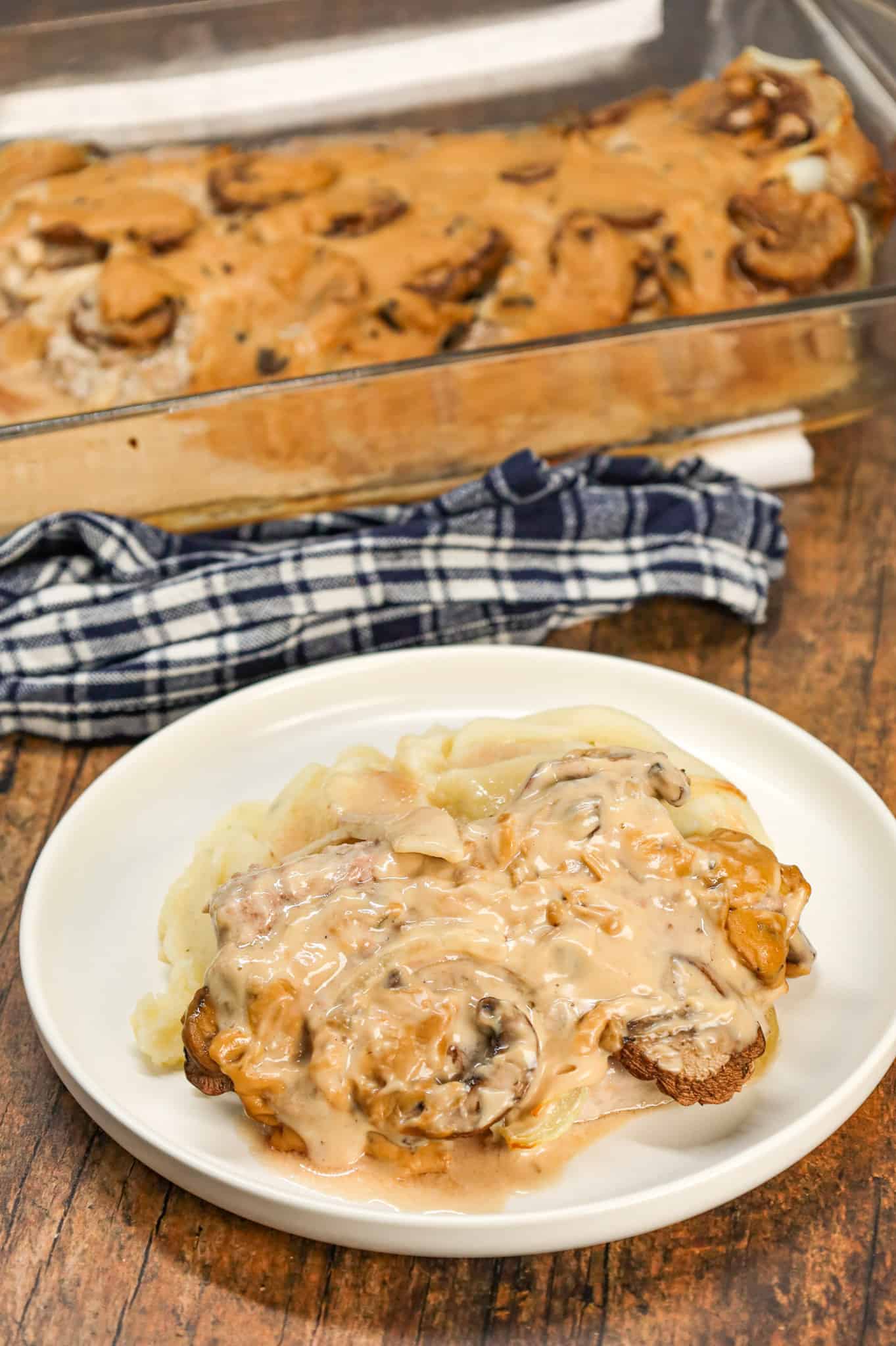 Cream of Mushroom Pork Chops are an easy baked pork chop recipe made with cream of mushroom soup, sour cream, pork gravy mix, sliced onions and sliced mushrooms.