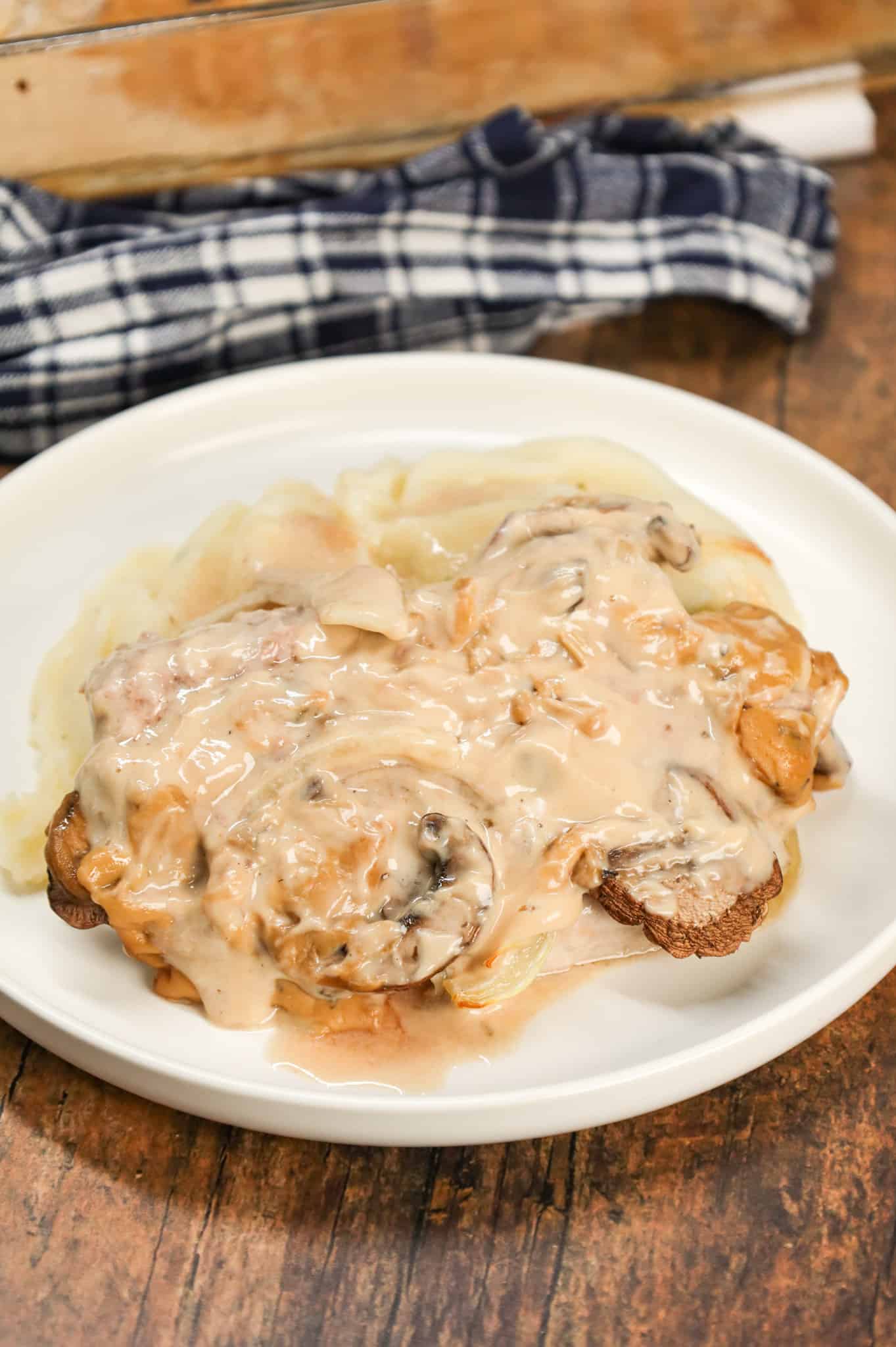 Cream of Mushroom Pork Chops are an easy baked pork chop recipe made with cream of mushroom soup, sour cream, pork gravy mix, sliced onions and sliced mushrooms.