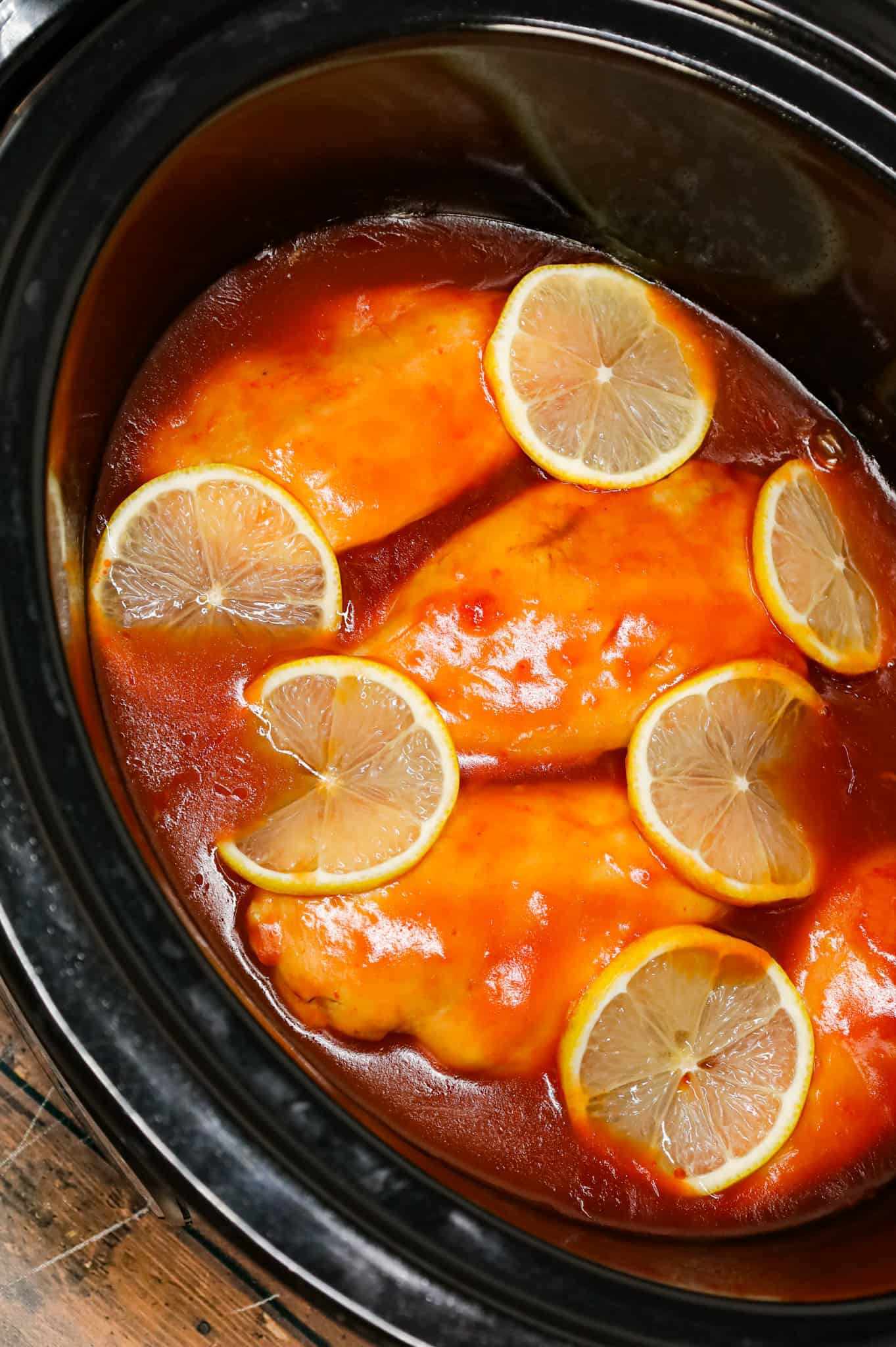 Crock Pot Lemonade Chicken is an easy slow cooker chicken breast recipe made with frozen lemonade concentrate, ketchup, brown sugar, Worcestershire sauce and cornstarch.