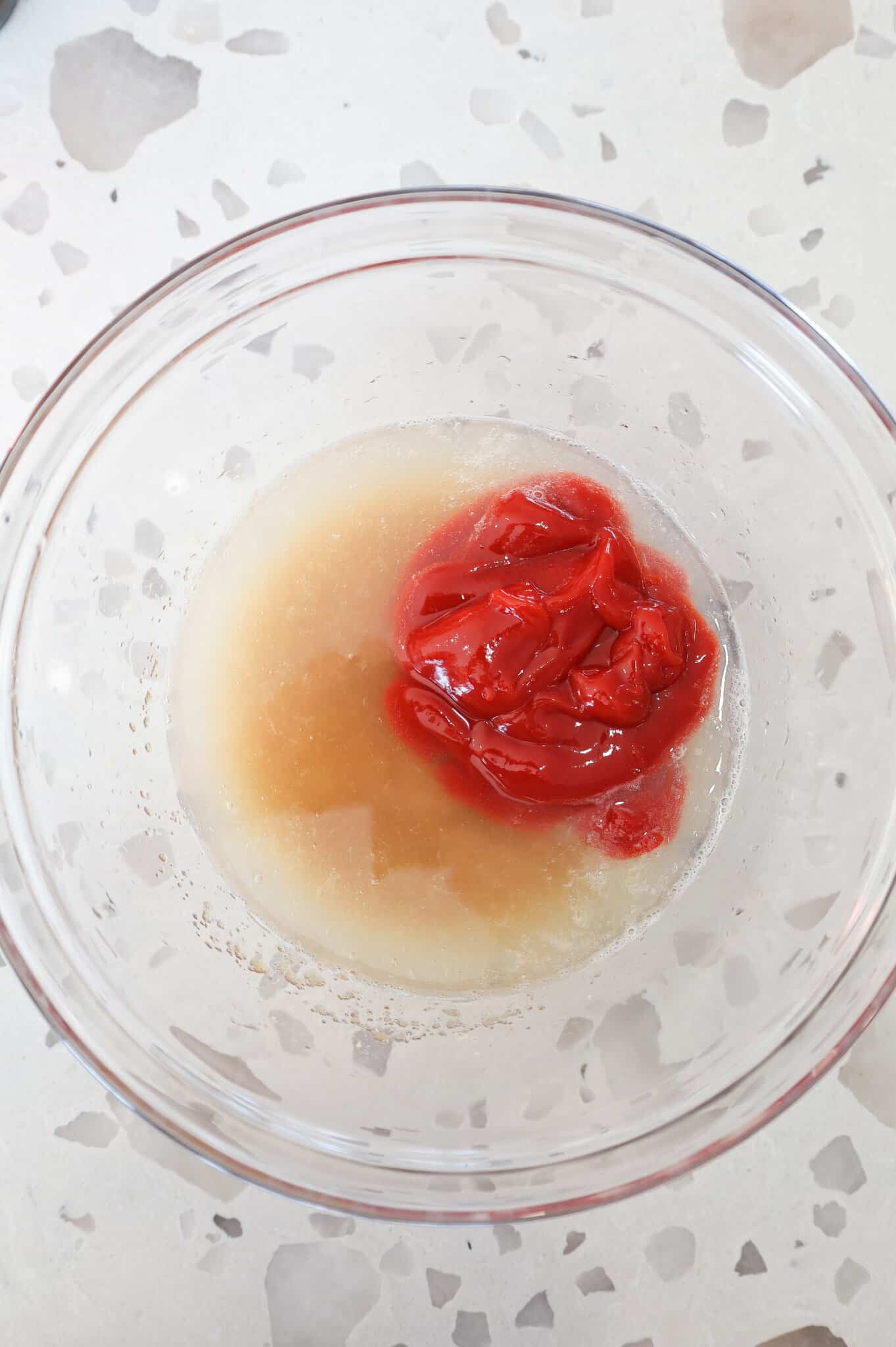 brown sugar, lemonade concentrate and ketchup in a mixing bowl