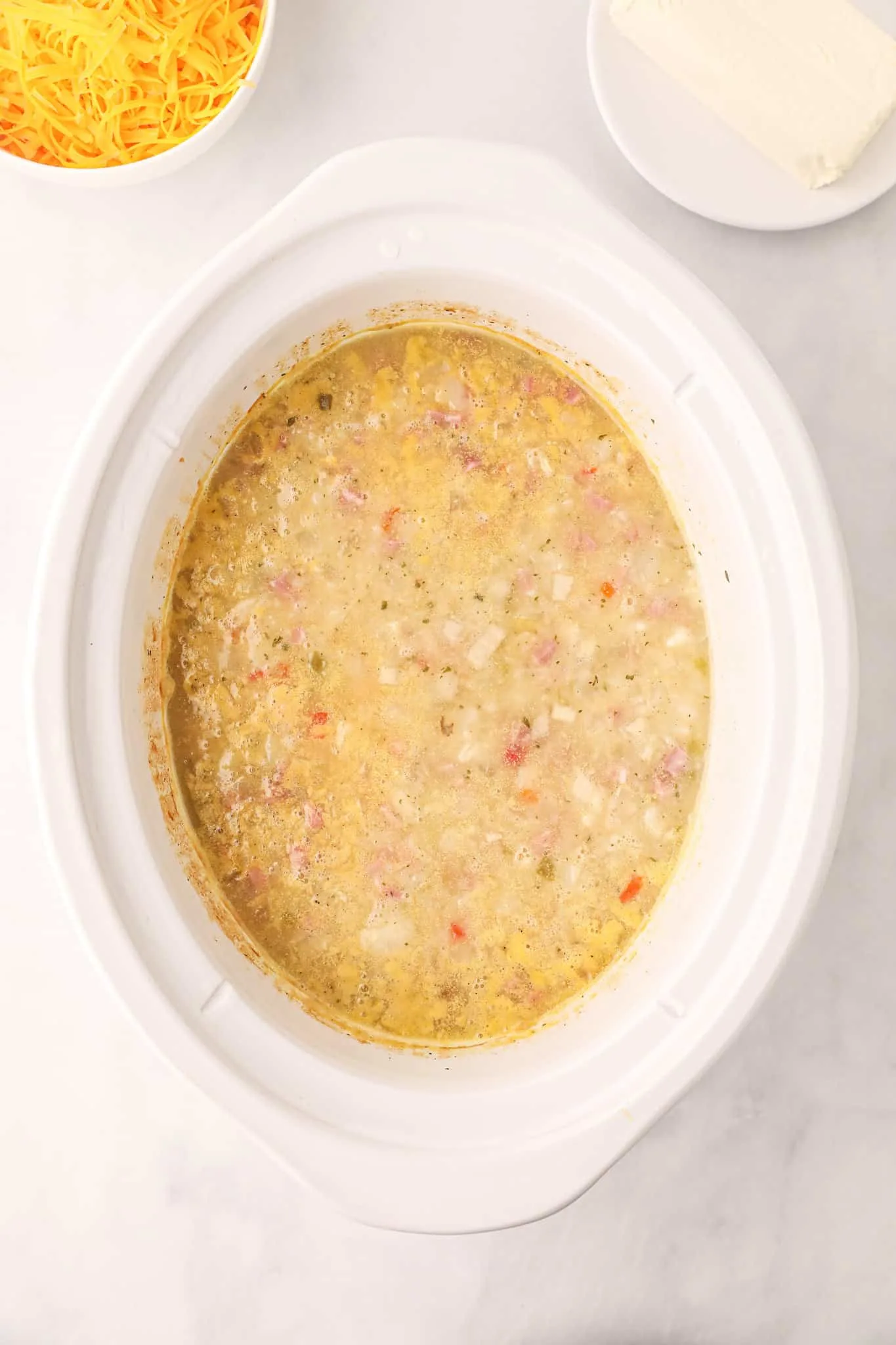 loaded potato soup in a crock pot after cooking