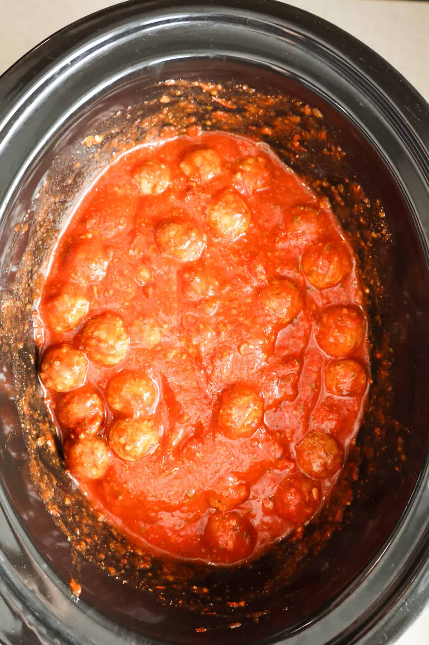 meatballs and marinara sauce in a crock pot