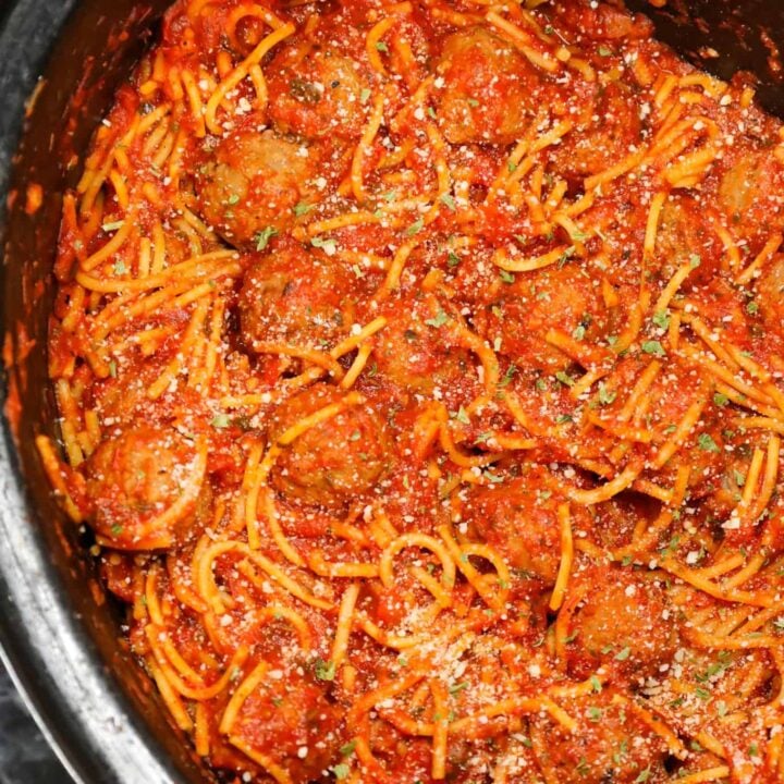 Crock Pot Spaghetti and Meatballs is an easy slow cooker dinner recipe made with frozen meatballs, marinara sauce, spaghetti and spices.