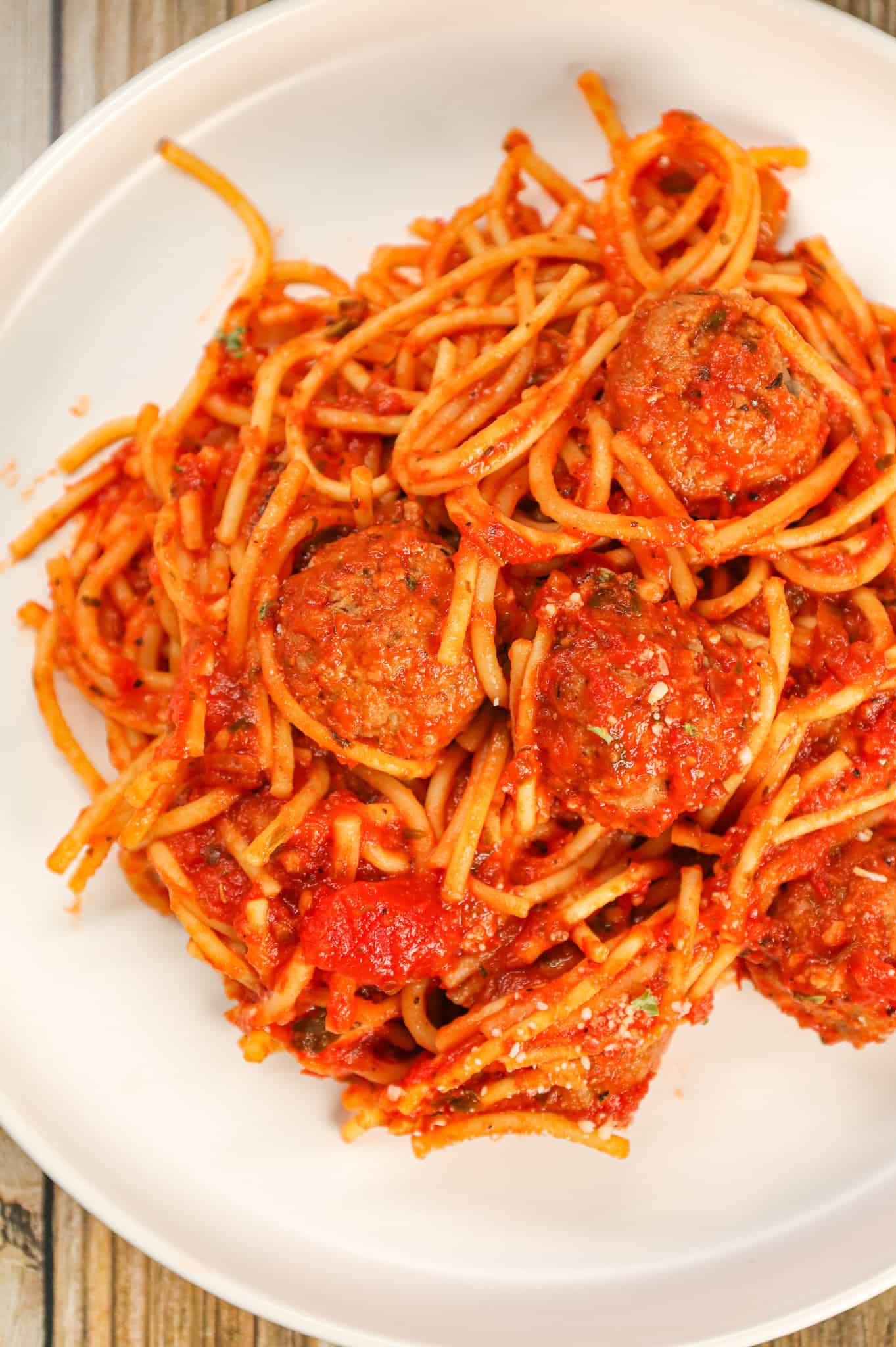 Crock Pot Spaghetti and Meatballs is an easy slow cooker dinner recipe made with frozen meatballs, marinara sauce, spaghetti and spices.
