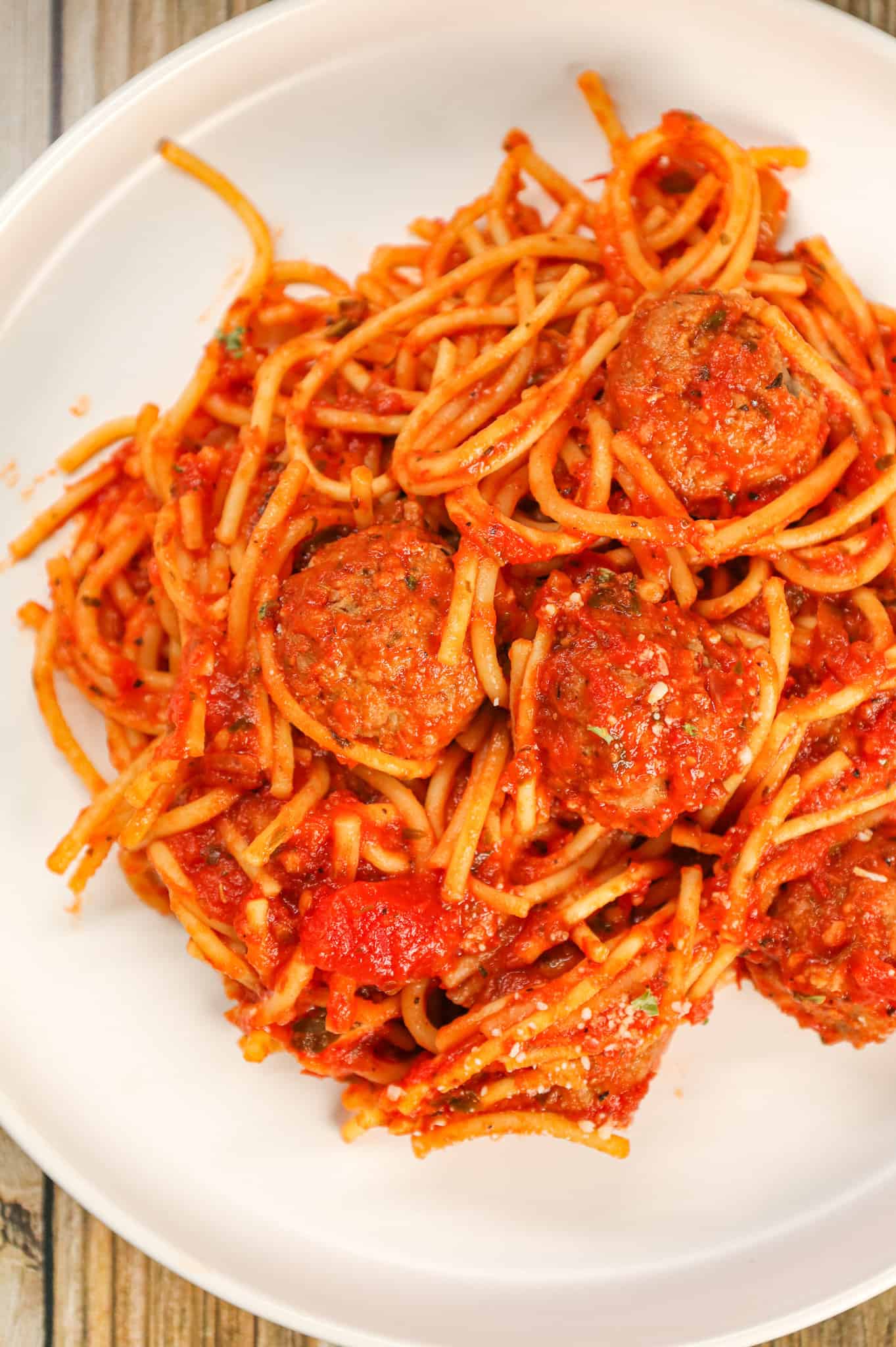 Crock Pot Spaghetti and Meatballs is an easy slow cooker dinner recipe made with frozen meatballs, marinara sauce, spaghetti and spices.