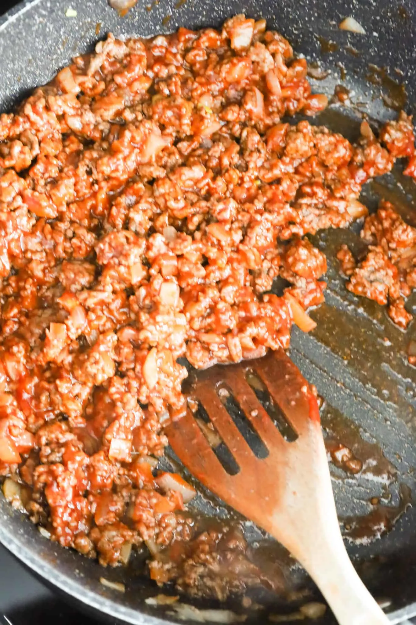ground beef and sloppy joe sauce mixture in a skillet