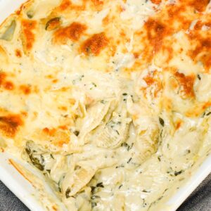Spinach Artichoke Pasta Bake is a creamy baked pasta recipe loaded with cream cheese, chopped artichoke hearts, chopped spinach, parmesan and mozzarella.