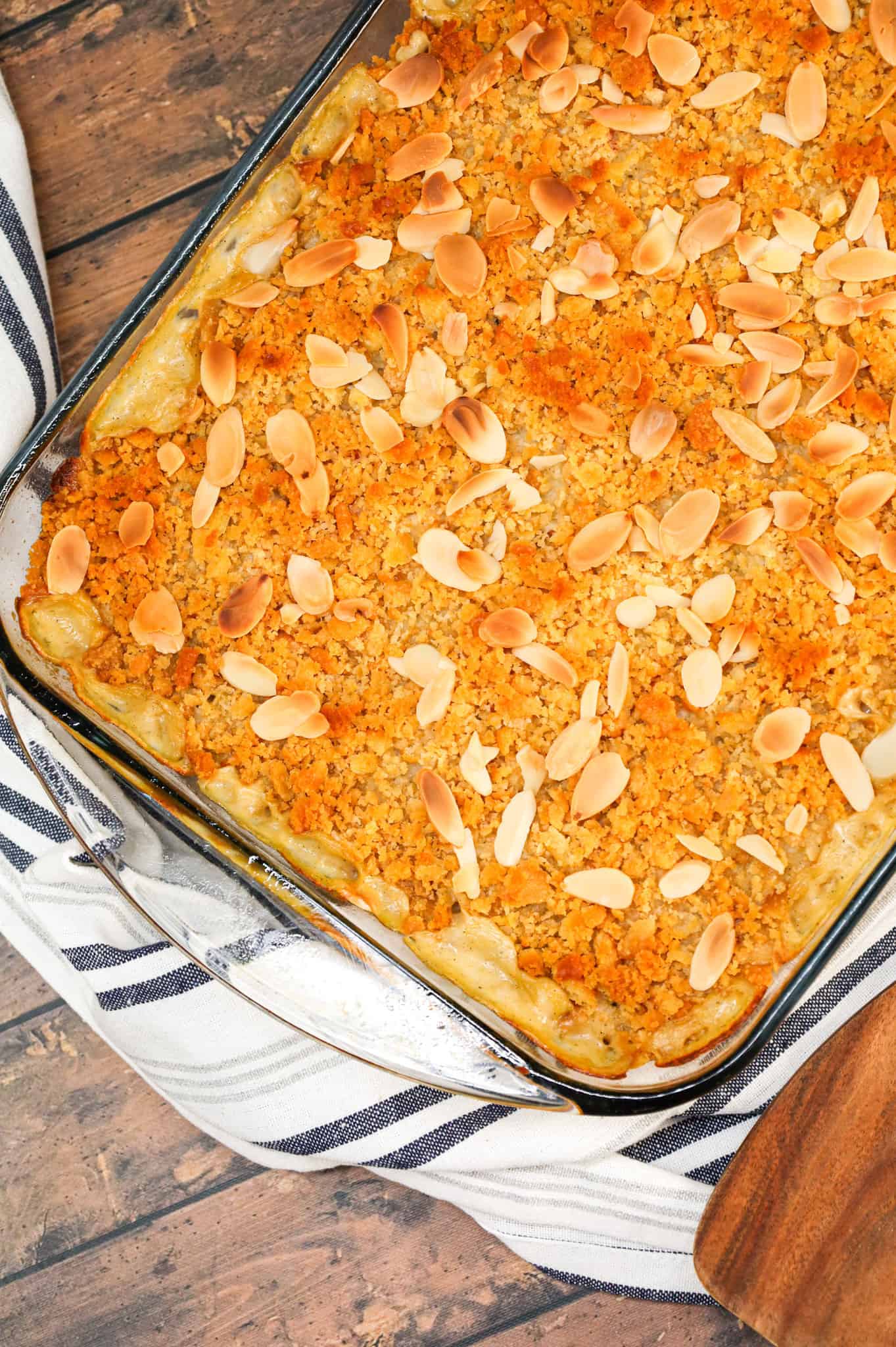 Water Chestnut Chicken and Rice Casserole is a hearty chicken casserole loaded with shredded rotisserie chicken, water chestnuts, almonds, pimentos and instant rice all topped with a buttery Ritz cracker crumb topping.