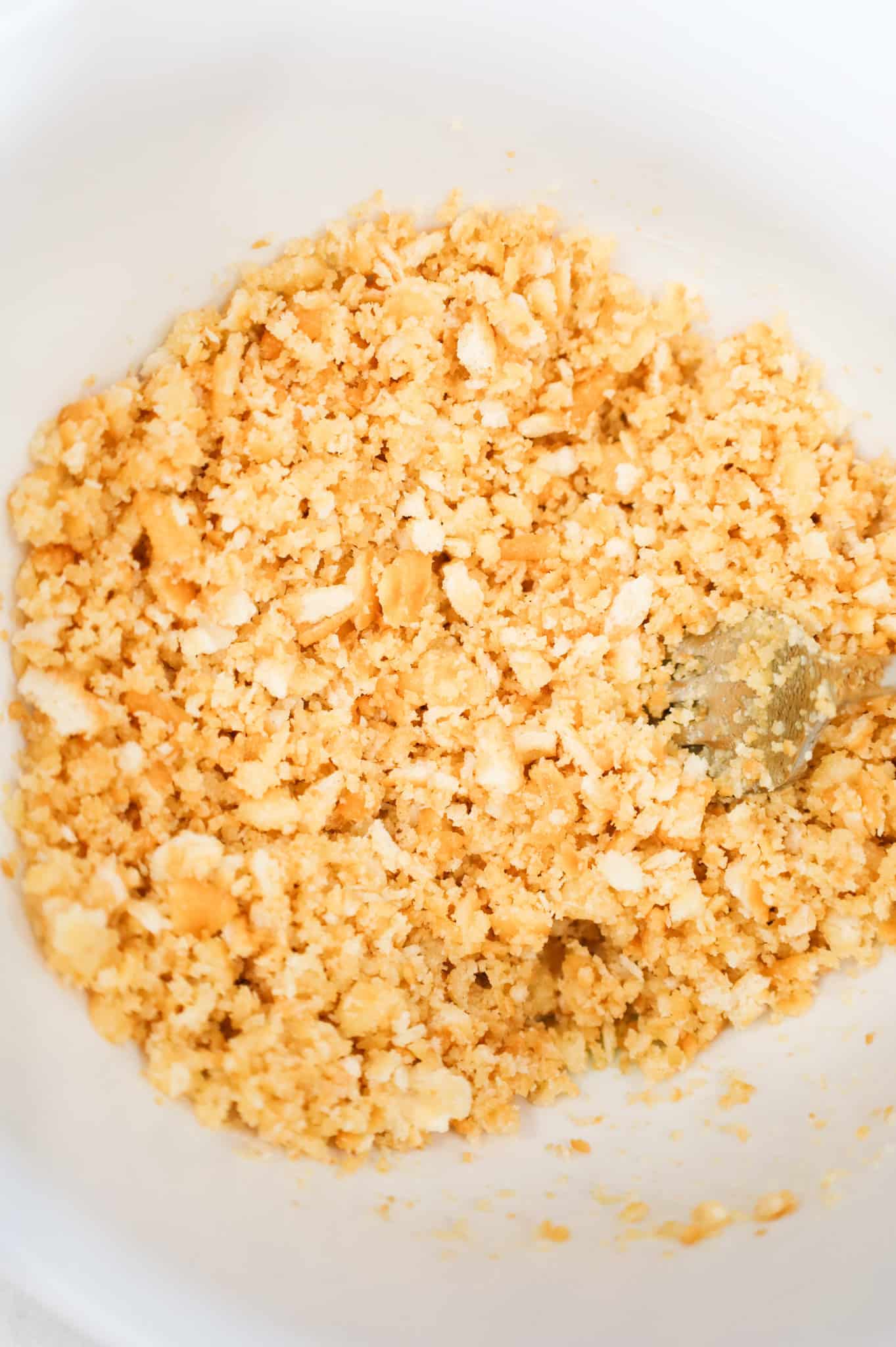 Ritz cracker crumb and butter mixture in a mixing bowl