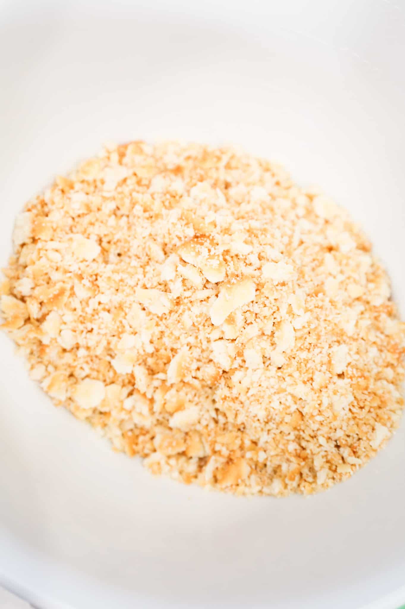 Ritz cracker crumbs in a mixing bowl