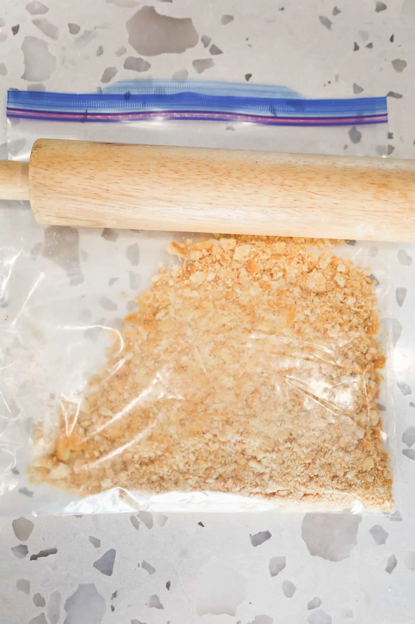 crushed Ritz crackers in a Ziploc bag