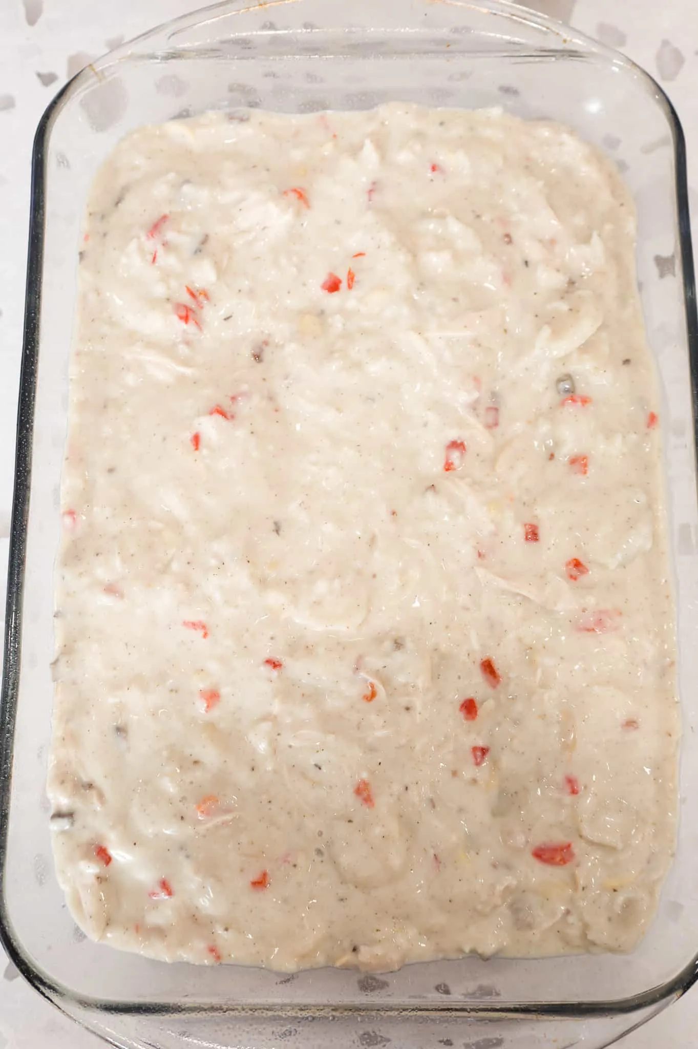 creamy chicken and rice mixture in a baking dish
