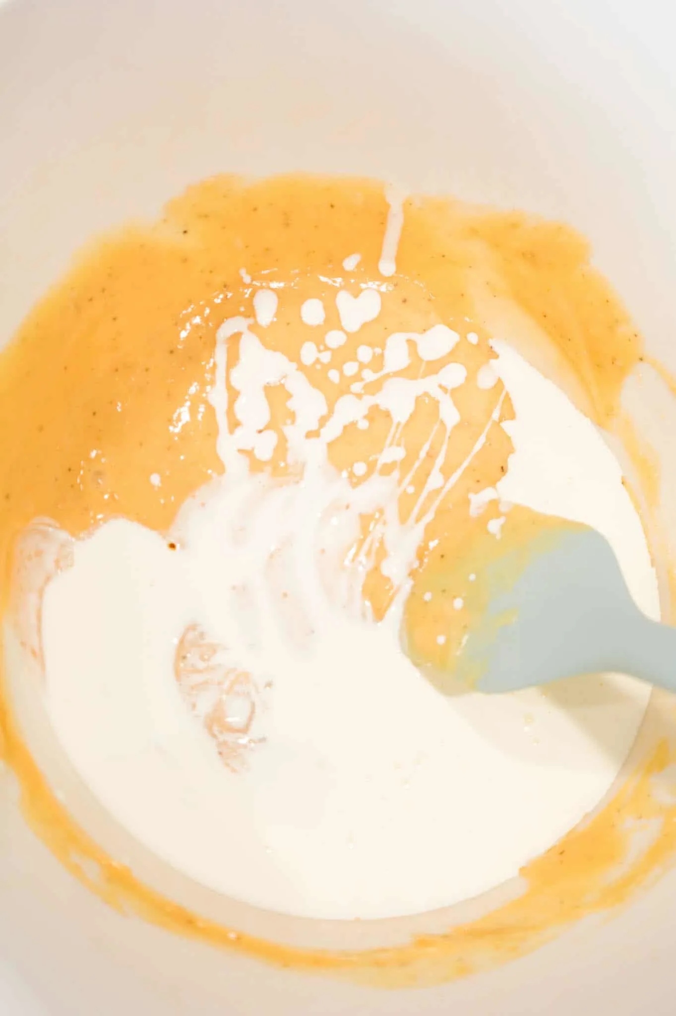heavy cream added to bowl with cream soup mixture
