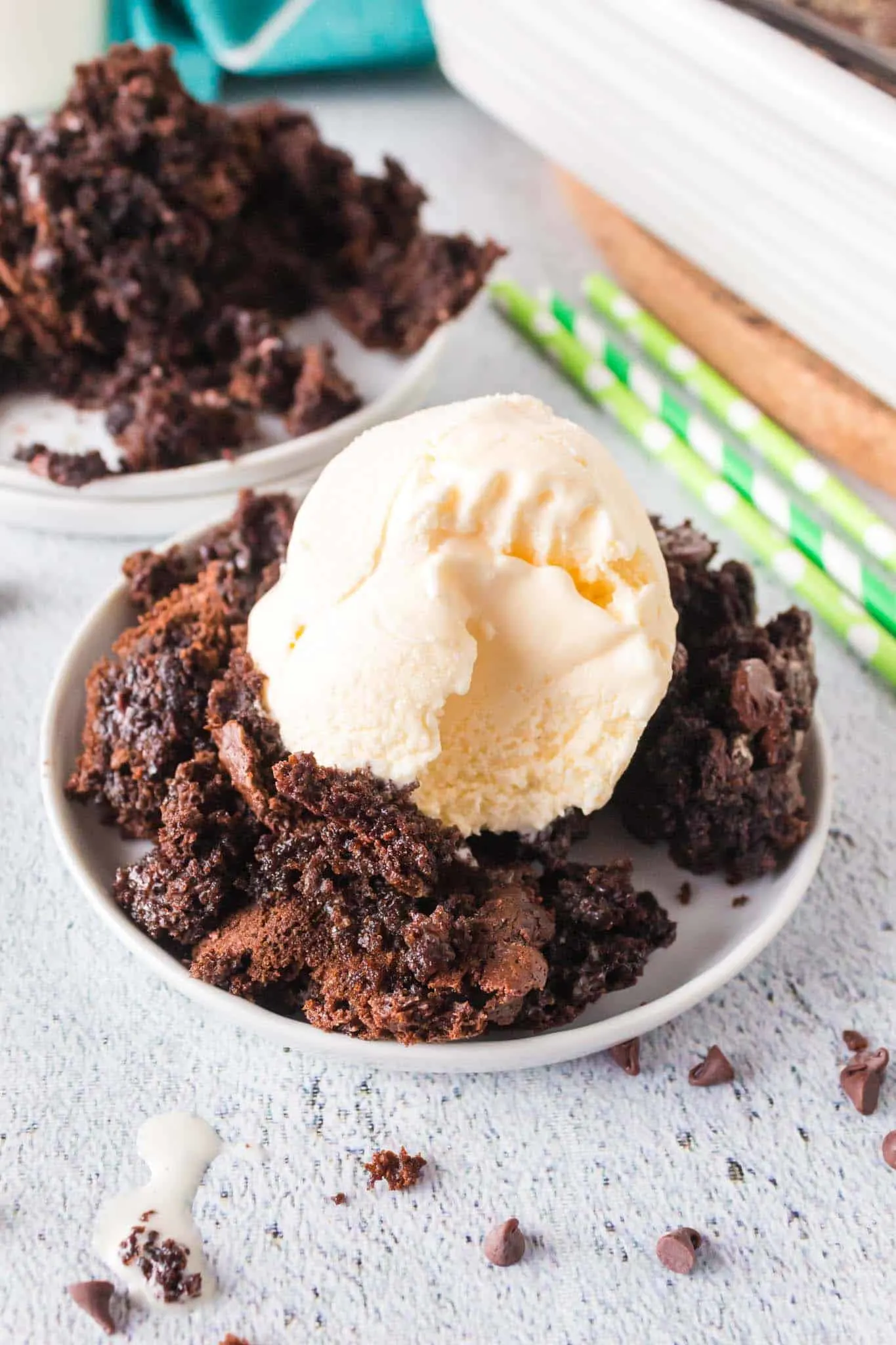 Chocolate Dump Cake is a simple and decadent chocolate dessert recipe using chocolate cake mix, chocolate pudding mix, chocolate chips, milk and butter.