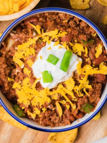 Crock Pot Chili is a hearty slow cooker ground beef chili recipe loaded with onions, bell peppers and kidney beans.