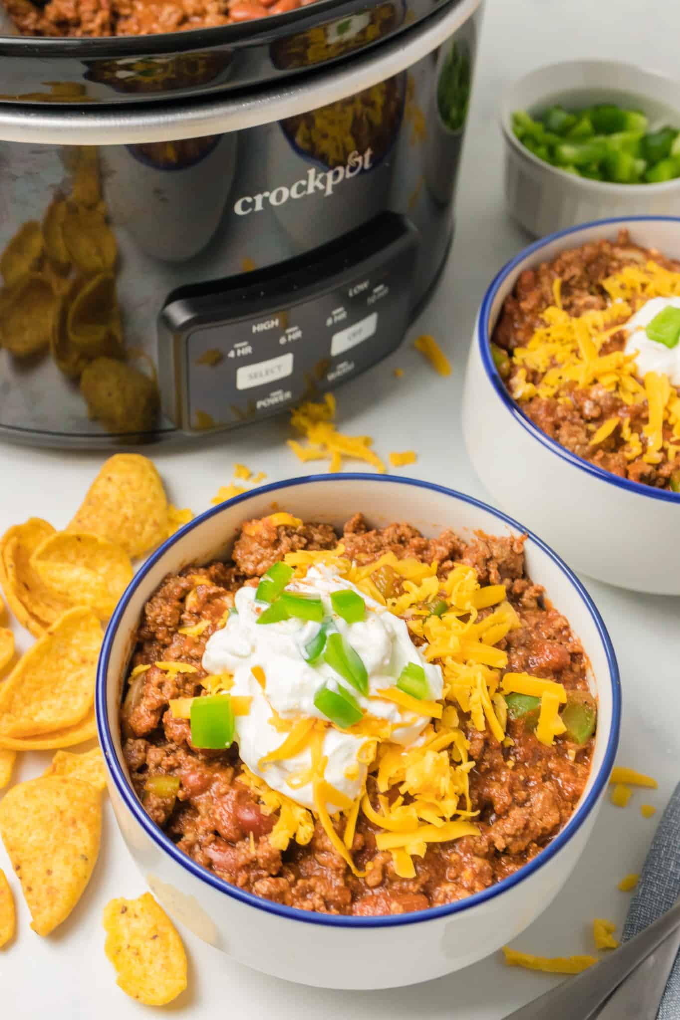 Crock Pot Chili is a hearty slow cooker ground beef chili recipe loaded with onions, bell peppers and kidney beans.