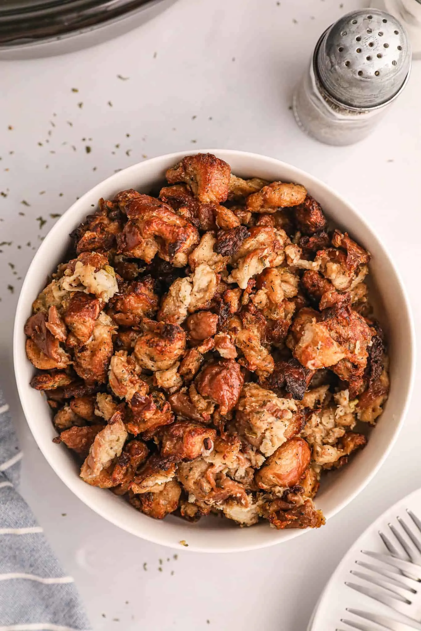 Crock Pot Stuffing is the perfect slow cooker holiday side dish made with packaged stuffing bread cubes, chicken broth, butter, celery, onions and spices.