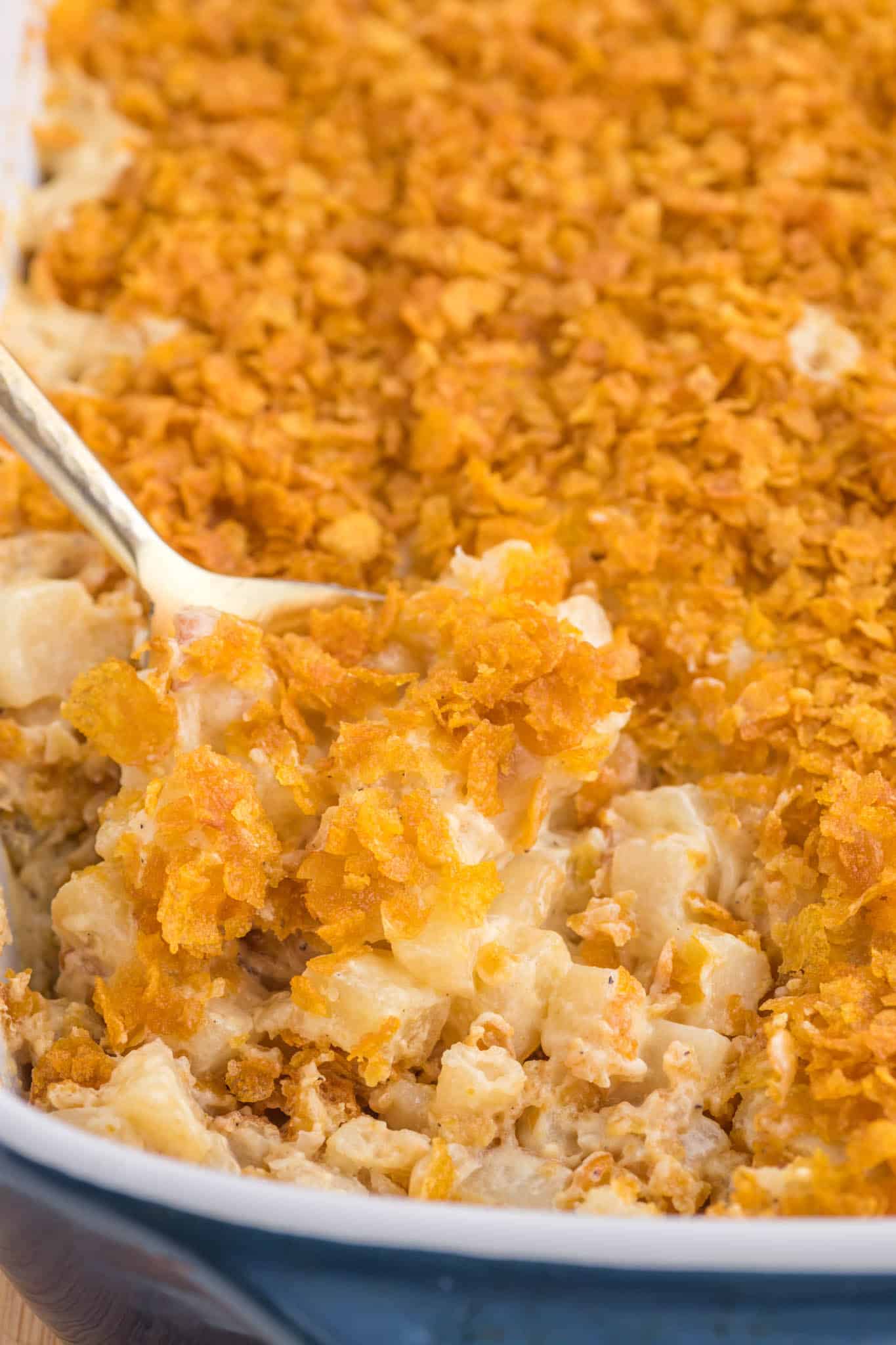 Funeral Potatoes are a delicious side dish with frozen diced hash brown potatoes baked in a creamy, cheesy mixture and topped with crushed cornflakes.