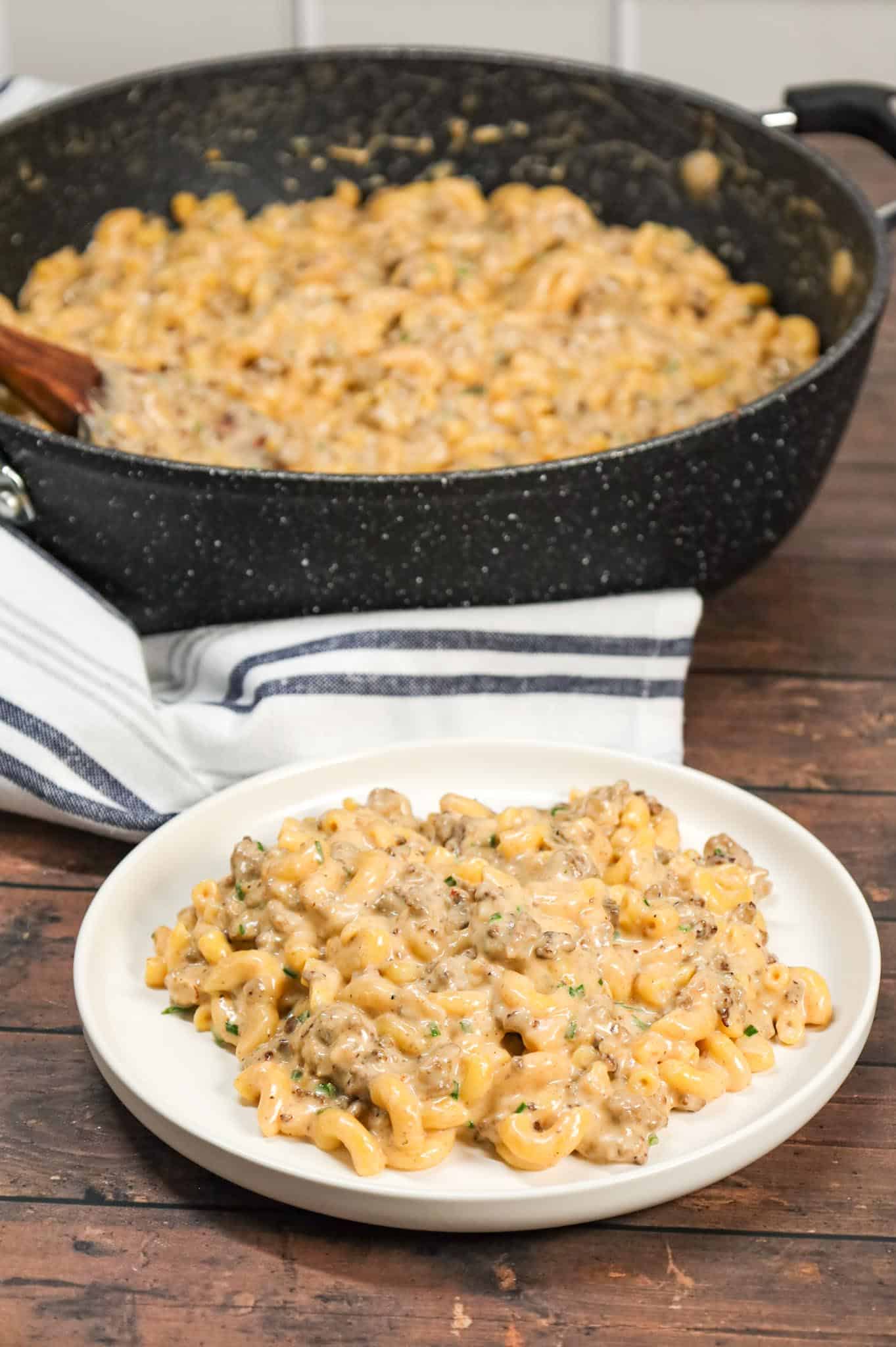 Hamburger Mac and Cheese is a creamy ground beef macaroni dish loaded with heavy cream, cheddar soup and shredded cheddar and mozzarella cheese.