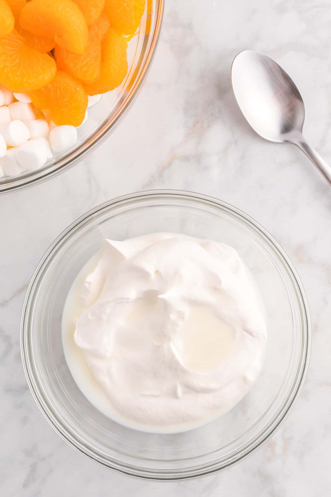 milk and Cool Whip in a bowl