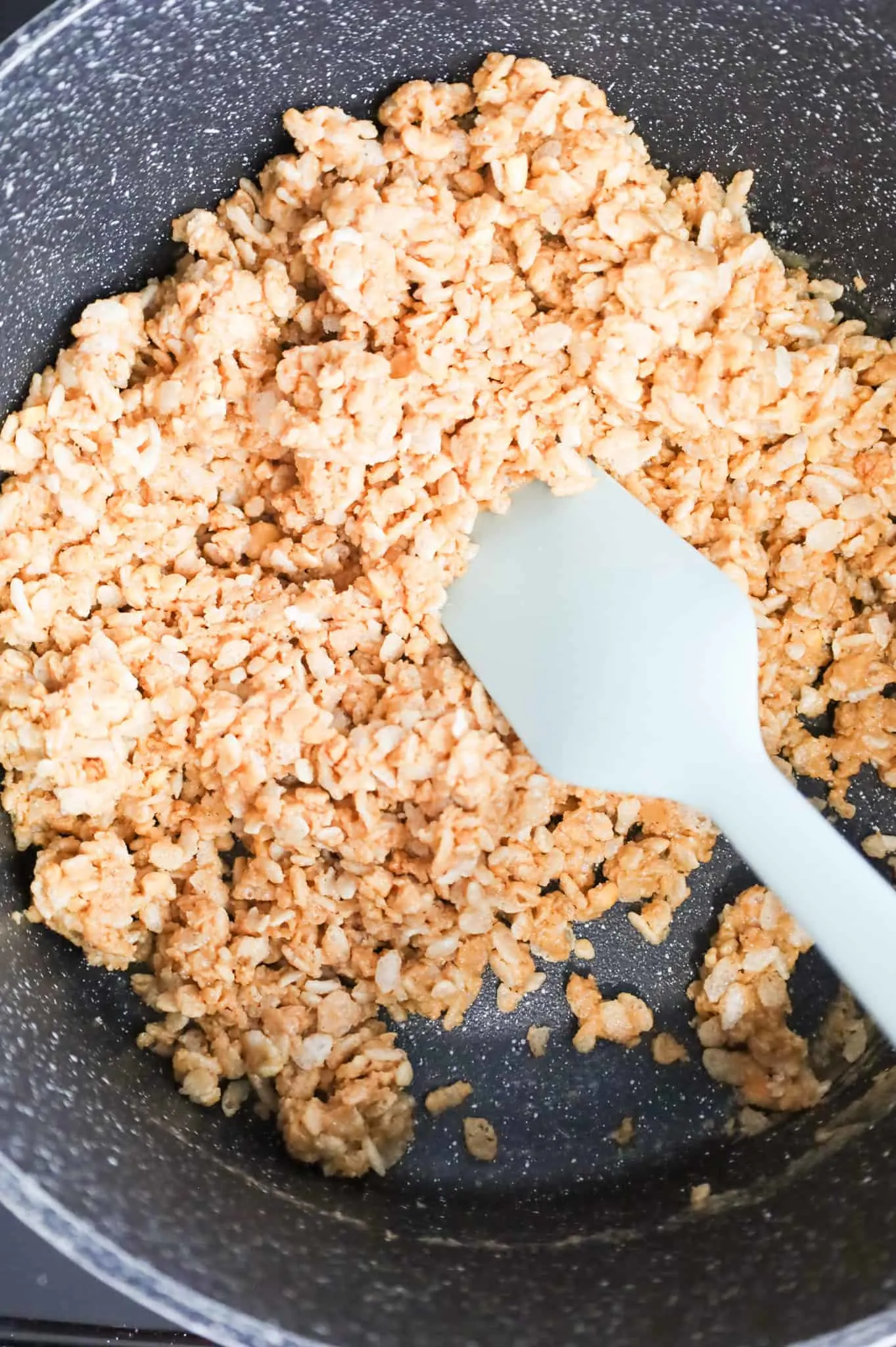 rice krispie and peanut butter mixture in a pot