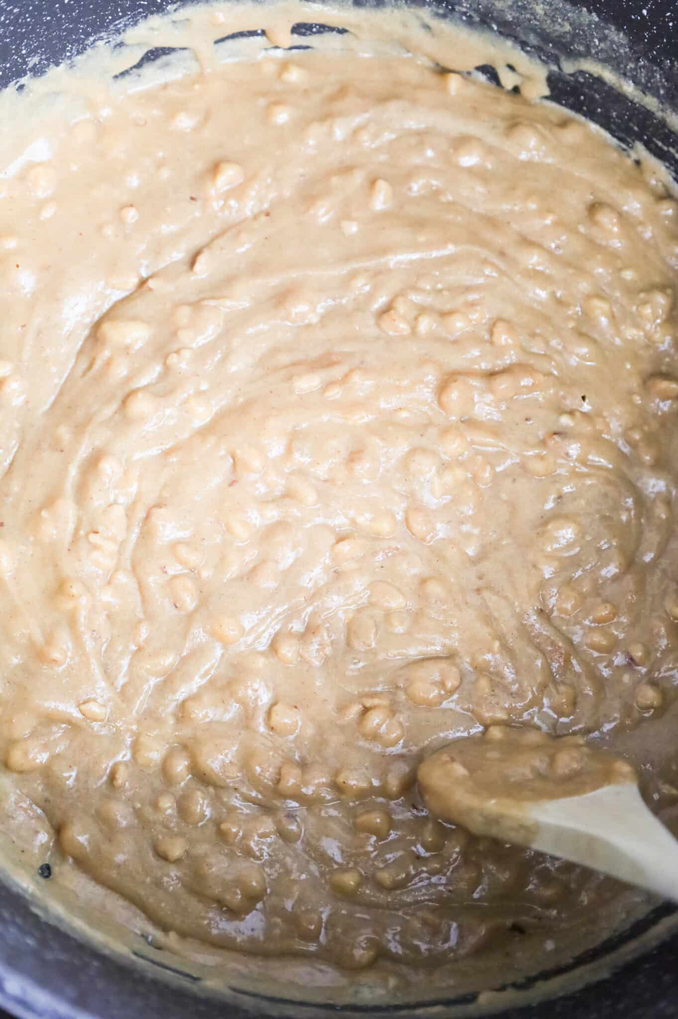 peanut butter, corn syrup and sugar bubbling in a pot