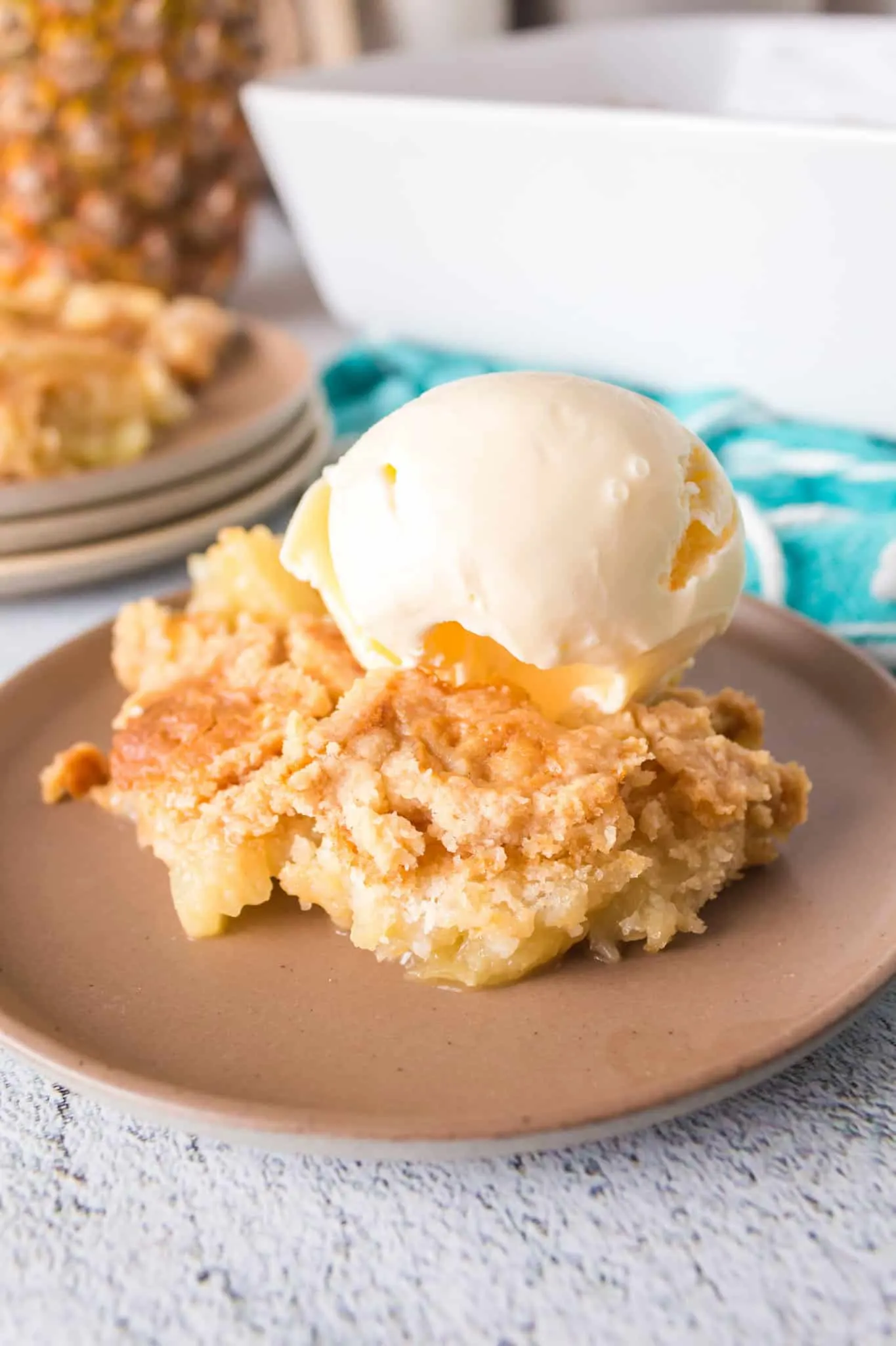 Pineapple Dump Cake is an easy dessert recipe using canned pineapple and boxed cake mix.