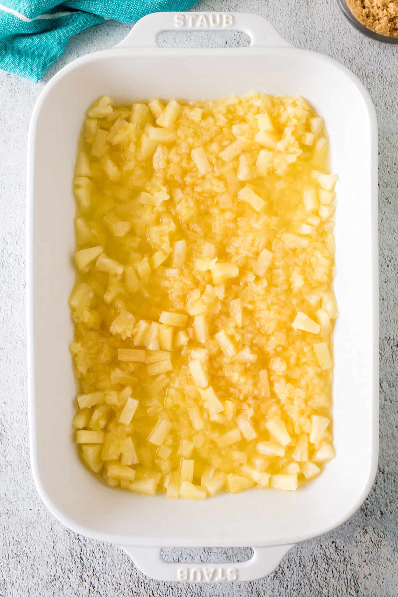 canned pineapple in a baking dish