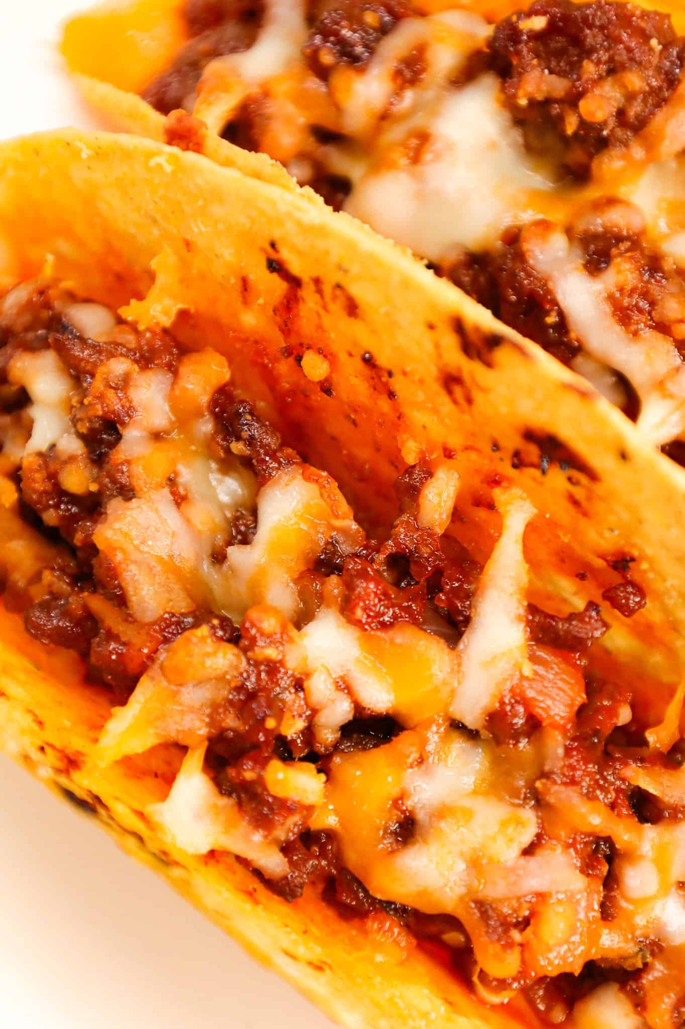 Sloppy Joe Tacos are hearty ground beef tacos with sloppy joe sauce and baked with cheese.